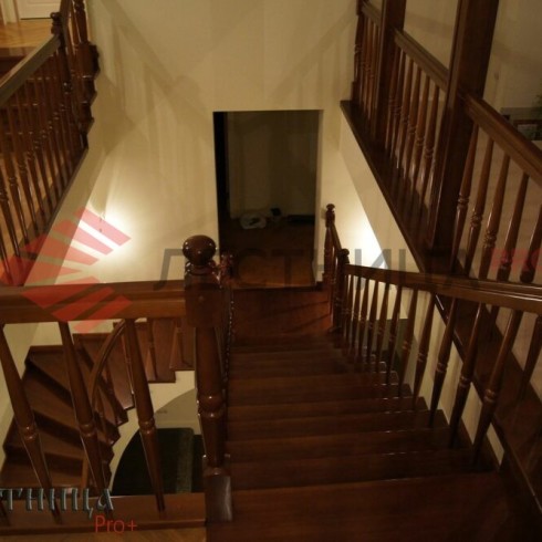 Лестница монилитная с облицовкой из лиственницы, авторская работа