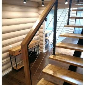 Сочетание лестницы с внутренним интерьером и мебелью.